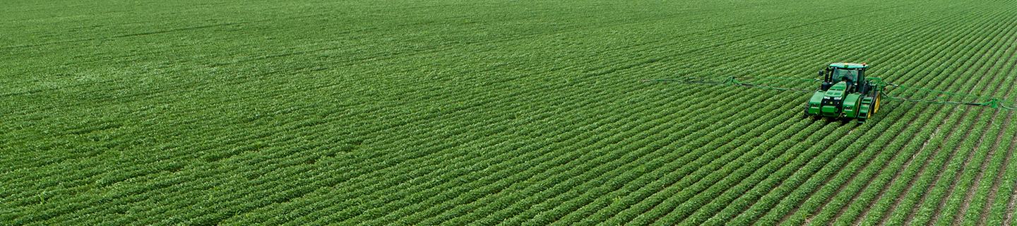 Tractor Driving In Field
